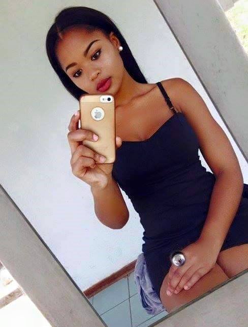 Sexy Light South African woman in Thigh High Mini Dress