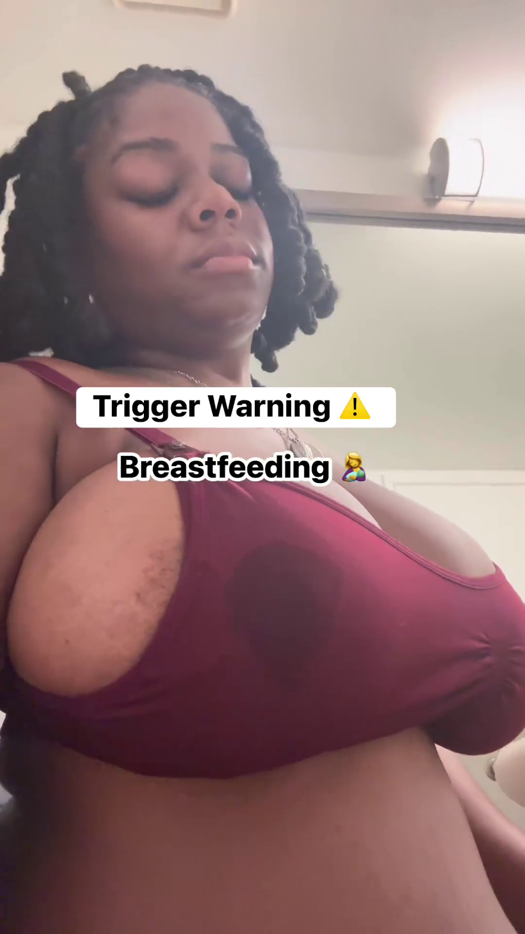 Horny African Woman Hangs Out Her Full Big Breasts - Pulls Her Top Up to Breastfeed - She is Doing for Attention To Attract Thirsty Fans. Exposing Breasts is a common trend on FB