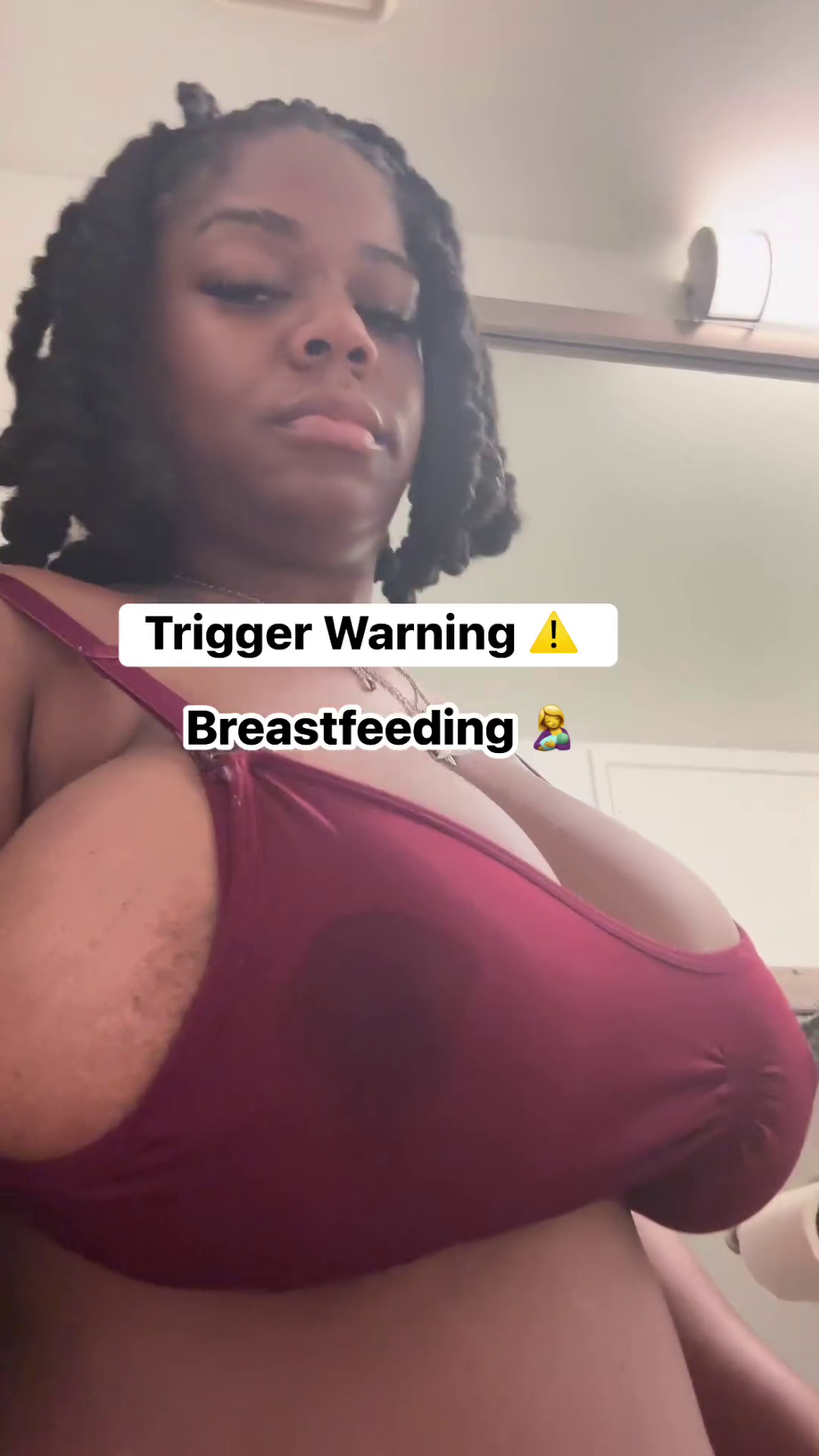 Horny African Woman Hangs Out Her Full Big Breasts - Pulls Her Top Up to Breastfeed - She is Doing for Attention To Attract Thirsty Fans. Exposing Breasts is a common trend on FB
