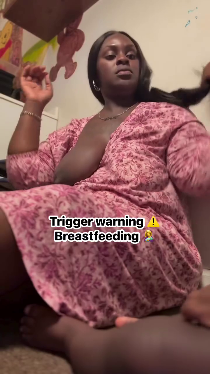 Horny African Woman Hangs Out Her Full Big Breasts -  Pulls Her Top Up to Breastfeed - She is Doing for Attention To Attract Thirsty Fans. Exposing Breasts is a common trend on FB