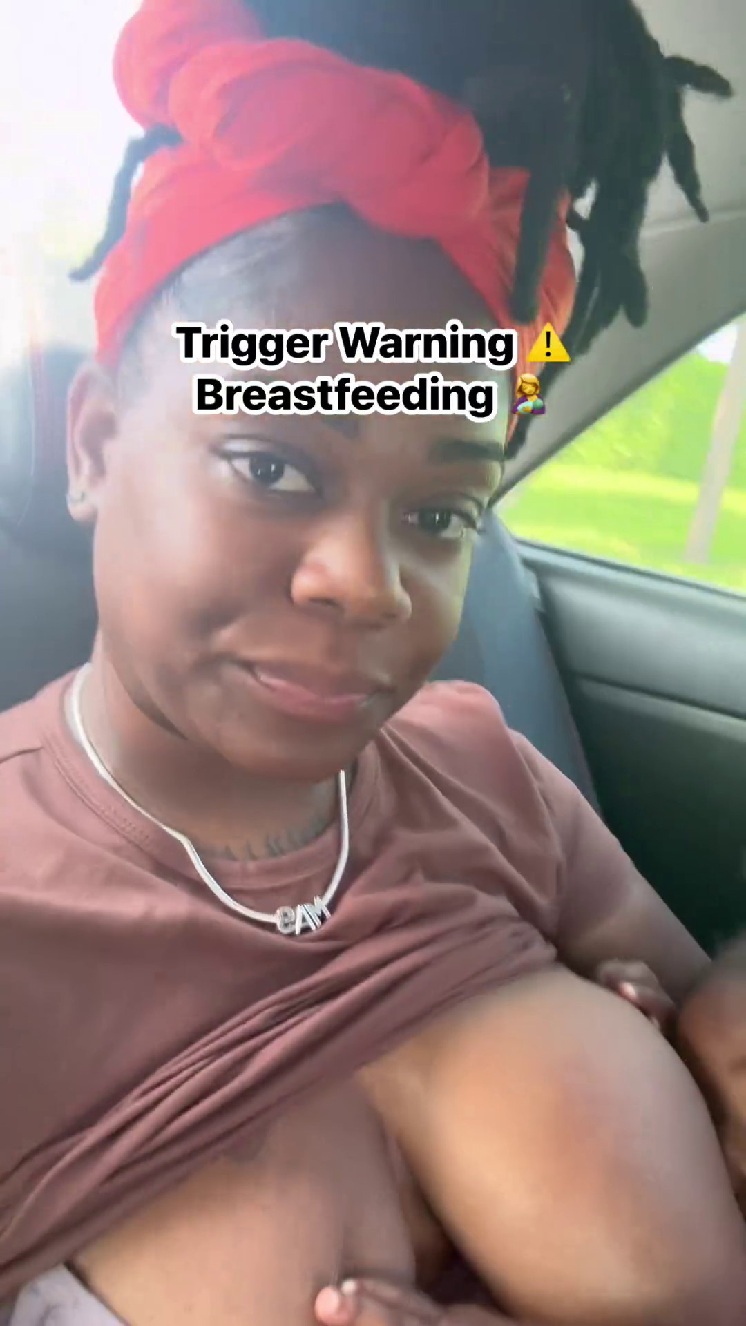 Horny African Woman Hangs Out Her Full Big Breasts - Pulls Her Top Up to Breastfeed - She is Doing for Attention To Attract Thirsty Fans. Exposing Breasts is a common trend on FB